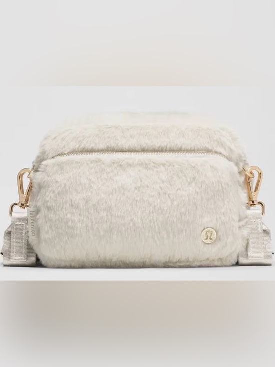 lululemon athletica Handbags - *NWT* Lululemon plush crossbody 2 litres w gold zippers and emblems
